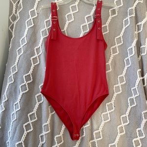 Worn Once not buttoned 
Forever21 coral mauve ribbed bodysuit w/ straps L